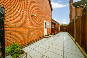 SIDE PAVED AREA WITH GATES TO FRONT- click for photo gallery